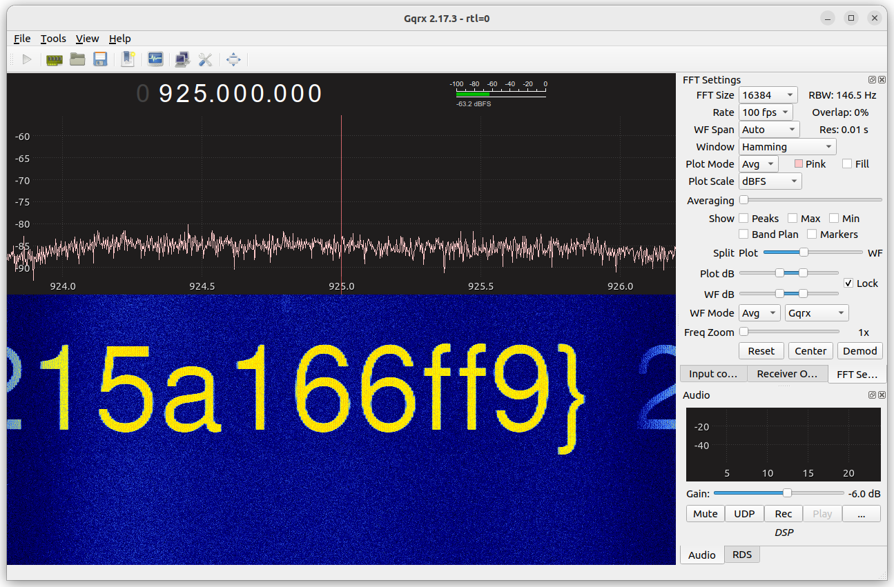 Screenshot of Gqrx, showing "15a166ff9}" in the waterfall